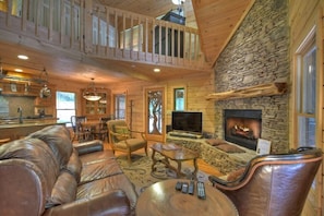 Relax in front of your stone fireplace in this tranquil sitting area