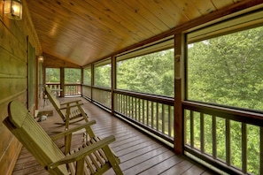 Screened in porch, perfect for grilling or early morning coffee