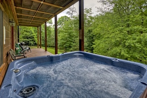 Relax in the hot tub after a long day of ziplining or whitewater rafting