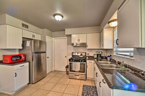 Make meals with ease using the fully equipped kitchen!