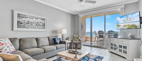 Living Room with access to Private Balcony overlooking the Gulf and Queen Size Sleeper Sofa