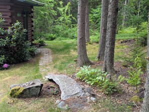 Cross over the stone bridge by Maine sculptor Obadiah Buel 
