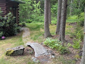 Cross over the stone bridge by Maine sculptor Obadiah Buel