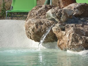 Pool. The source that opens onto the pool