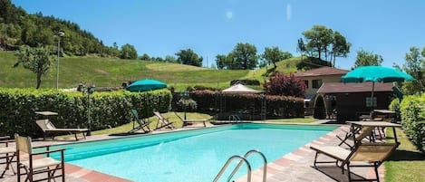 Pool. pool area, fenced with sunbeds, parasols