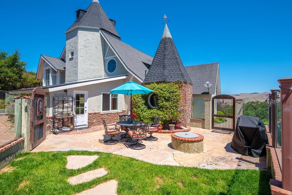 Patio with views, gas fire ring, and santa maria style bbq.