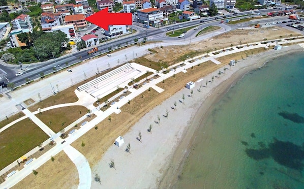 the house and the new beach (100 m)