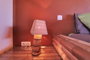 Sleeping area. Bedroom featuring Bamboo detailing
