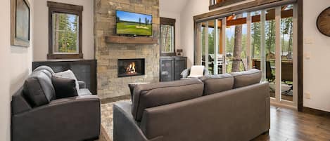 Maple Leaf Retreat - Fantastic great room with a Gas Fireplace, TV, and sliding doors leading out to the deck.