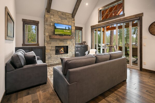 Maple Leaf Retreat - Fantastic great room with a Gas Fireplace, TV, and sliding doors leading out to the deck.