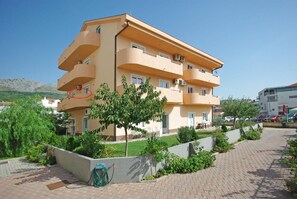 balcony of the apartment (red circle)