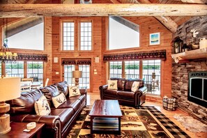 Main level living/dining room with gorgeous views of the lake.