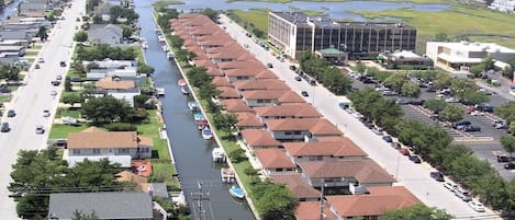 Aerial view of the Beach Club Community alongside the canal on 112th St.