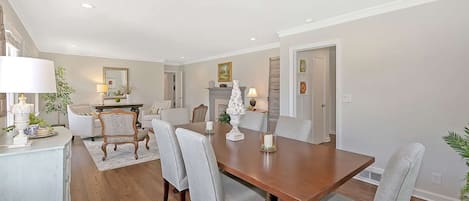 Wonderful family memories will be made in this beautiful dining room that over looks the front sitting area,