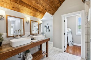 The primary ensuite bathroom also has a door to the trundle bed room.