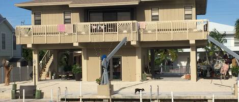 View of back of the house from across the canal. 