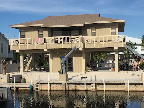 View of back of the house from across the canal. 