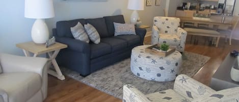 Our "beach themed" living room is decorated with NEW upscale furniture.