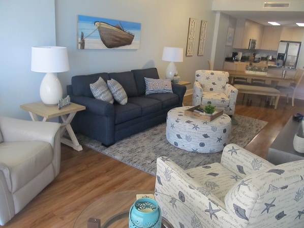 Our "beach themed" living room is decorated with NEW upscale furniture.