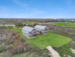 Escape to tranquility at this beachfront retreat, with one or both homes!