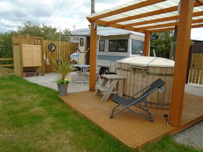 retro bedford camper with hot tub  sauna   and pool