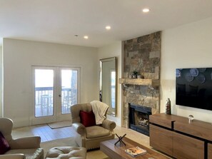 Plenty of seating around Fireplace and TV