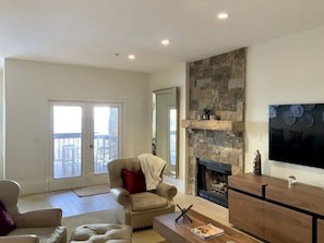 Plenty of seating around Fireplace and TV