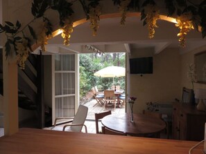 View from galley kitchen through to garden