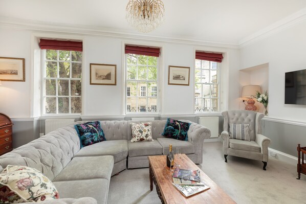 Beautiful spacious living room. Comfortable corner sofa . Over looking Abbey Green