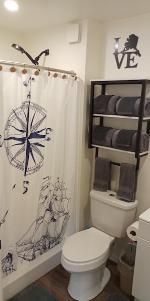 Beautiful 4 foot shower, complete with shampoo, conditioner and soap!