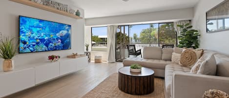 2nd floor: living room with pool view