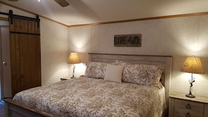 King size bed in master bedroom