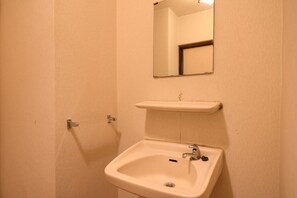 With shower and toilet