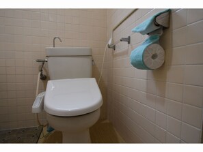 With shower and toilet
