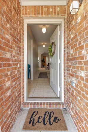 Welcome to your home away from home! Private access with a covered front porch.