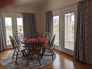 Dining Room which leads to the balcony.