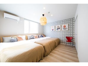 [Room B] Spacious bedroom. *Cushion is an image.
