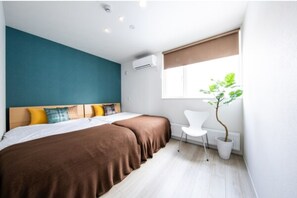 [Room B] Spacious bedroom. *Cushion is an image.