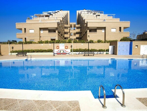Water, Sky, Building, Blue, Swimming Pool, Azure, Shade, Condominium, Leisure, Outdoor Furniture