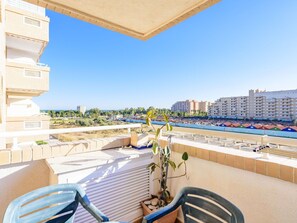 Sky, Furniture, Building, Shade, Seaside Resort, Outdoor Furniture, Chair, Condominium, Swimming Pool, Urban Design