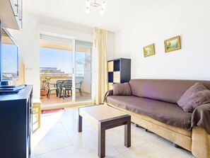 Furniture, Property, Couch, Azure, Comfort, Interior Design, Table, Wood, Living Room, Floor