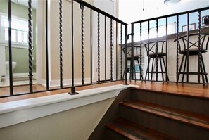 Stairway to apartment with gated entry to ensure safety.