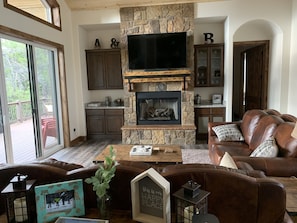 Open floor plan living room , beautiful fireplace
