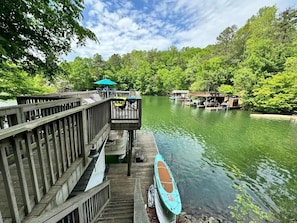 2 Stand-up paddle boards with seats to convert into kayaks. Relaxing deck on top