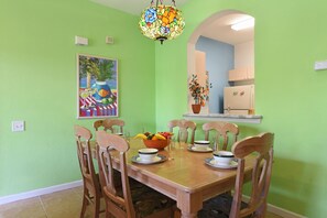 Bright and inviting dining area, perfect for family meals or a cozy dinner for two.