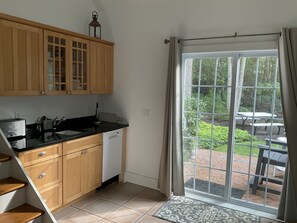 Kitchen with dishwasher full size refrigerator