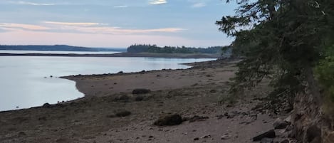 Private beach in front of the main cabin