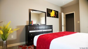 Let the bold colors give you a boost of energy. 1st Queen Bedroom