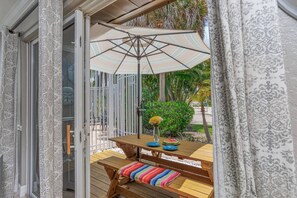 Enjoy some fresh sea salt breezes on your private patio and picnic table.  Just a few steps to the pool.