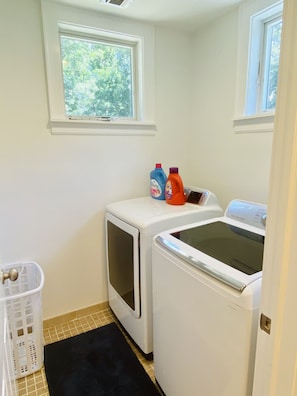 The laundry is off the master bedroom for convenience.
